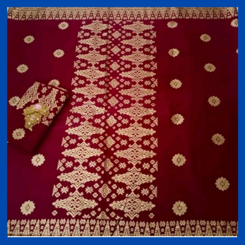 kain batik Prada emas Ashanty warna maron