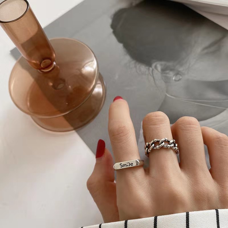 Cincin Model Hollow Motif Tulisan Bahan Alloy Warna Silver Gaya Korea Untuk Wanita