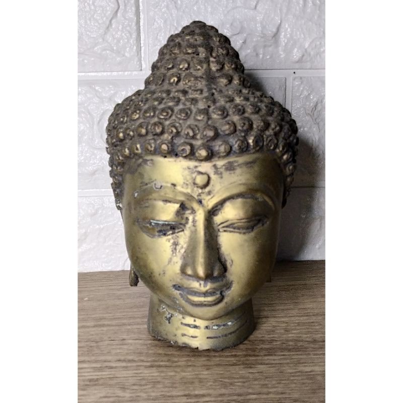 Patung kepala budha kuningan