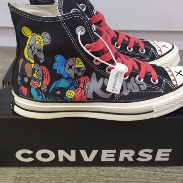 harga converse x kaws