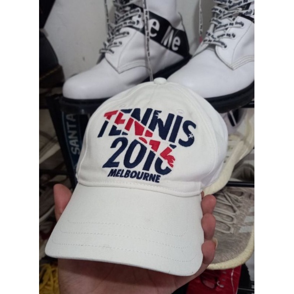topi tennis lacoste ori second