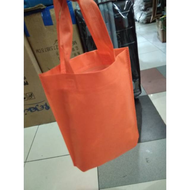

Tas kain lipat bawah spunbond /terlaris dan murah isi 12 pcs(25*30)