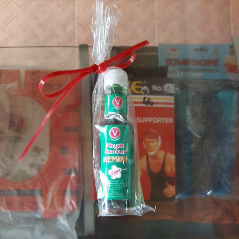 *minyak rambut kemiri vycaris 50ml*
