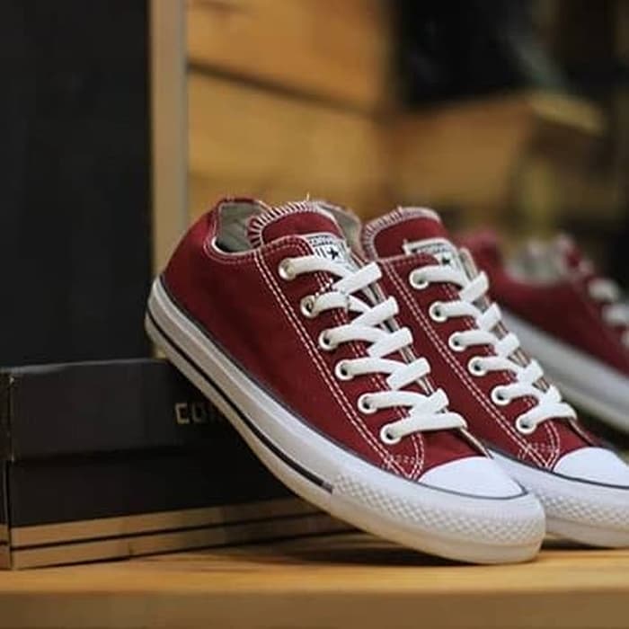 maroon colored sneakers