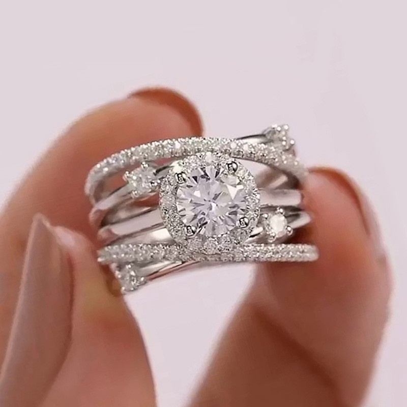 Cincin Wanita Model Silang Lebar Hias Cubic Zirconia Bling Warna Silver Untuk Pesta