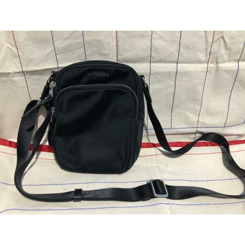 Preloved Tumi sling bag Original