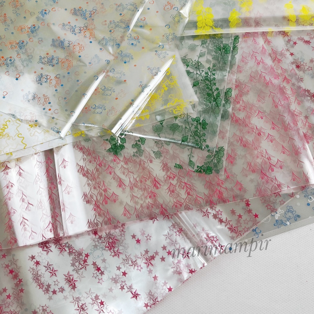 

PLASTIK PARSEL / KADO TRANSPARAN MOTIF UK. 95 X 75 CM ( 10 PCS )