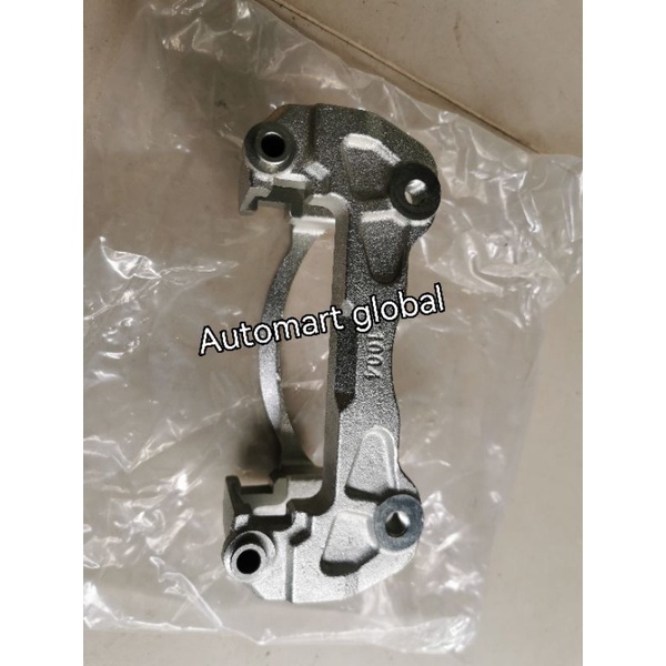 bracket caliper rem depan triton 1pc