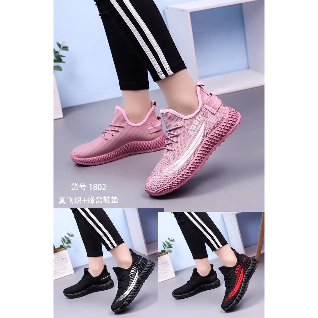 Sepatu wanita sneakers 2022 Sepatu olahraga rajutan terbang sports shoes Bahan Full Karet Anti Licin