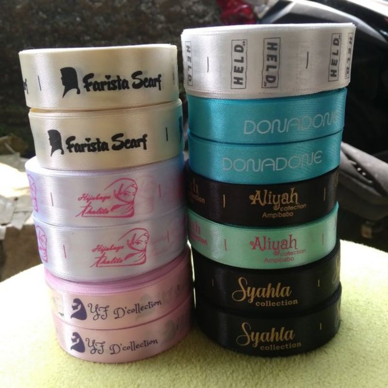 

label pita satin, label pita custom, label baju, label hijab, label baju