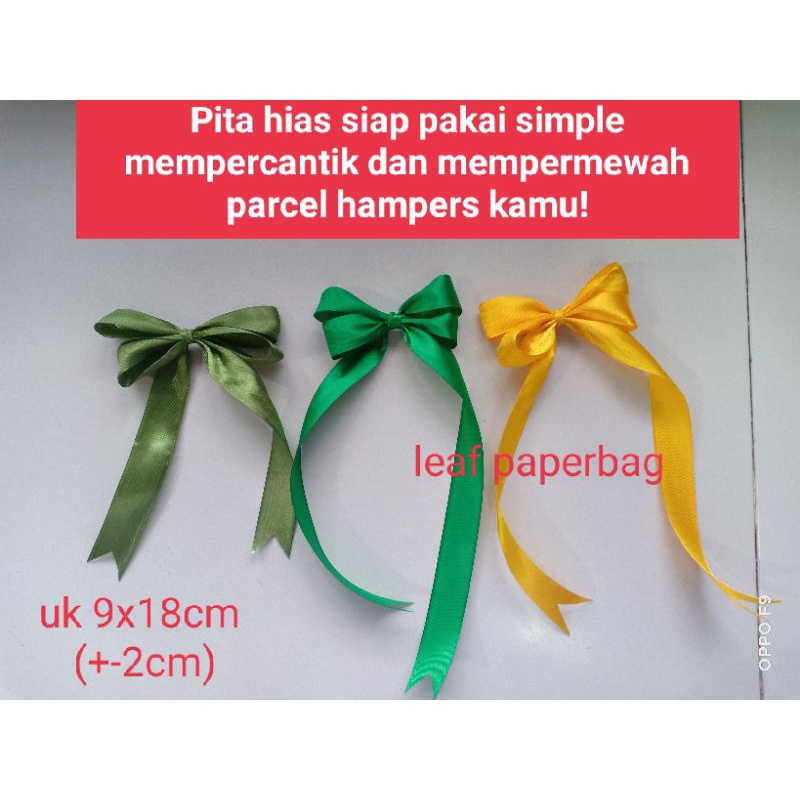 

pita hias jadi siap pakai lebaran / pita hias lebaran / pita hias parcel lebaran / pita hias parcel idul fitri / pita hias murah / pita satin siap pakai / pita hias satin dekorasi hampers