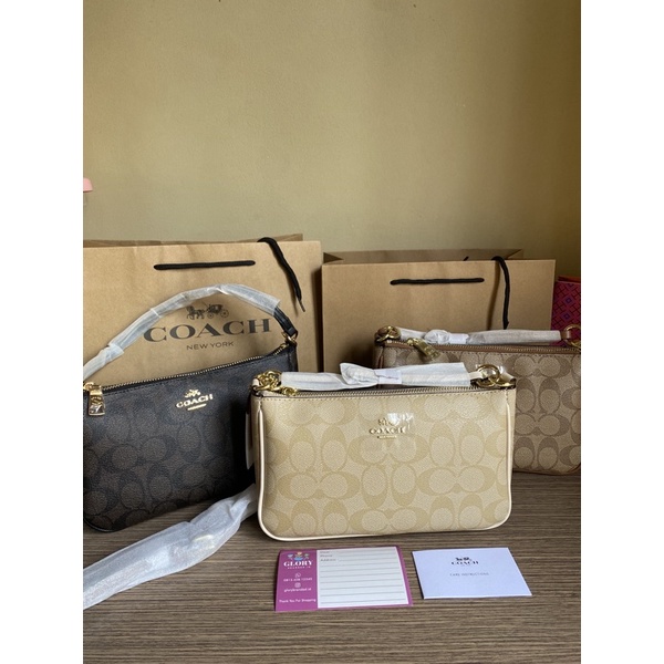coach nolita signature
