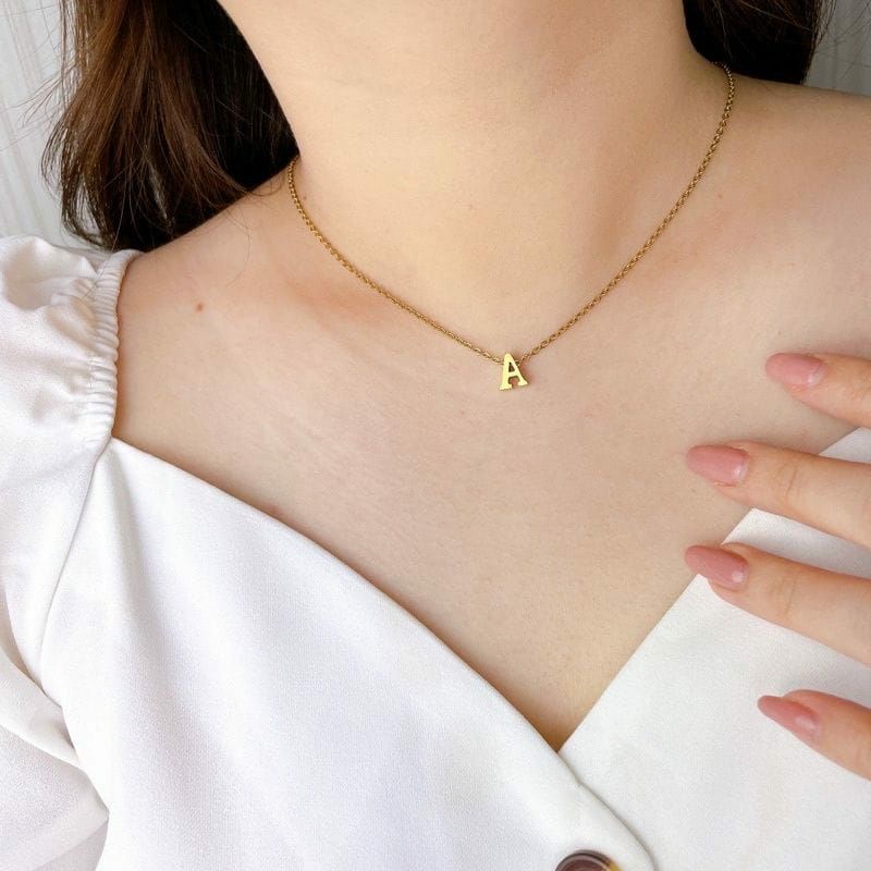 Kalung titanium inisial  huruf kualitas terbaik PXM M,D-4
