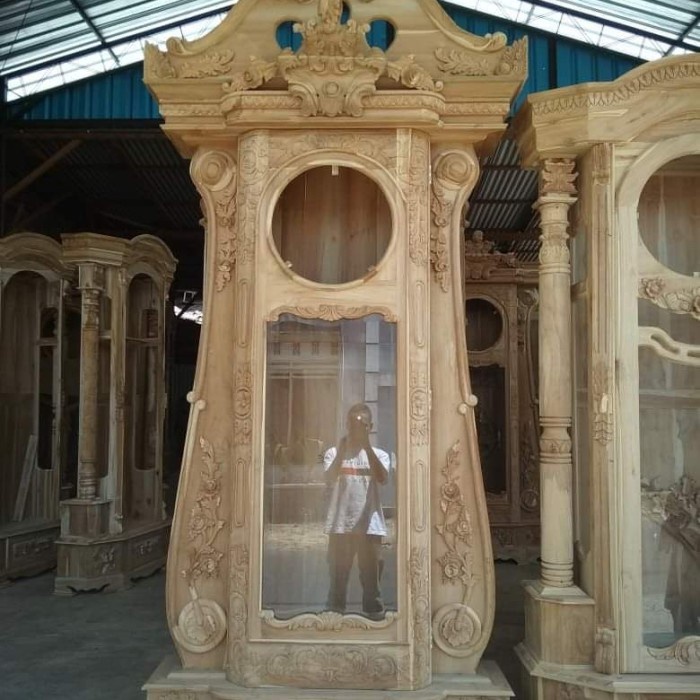 LEMARI JAM JATI UKIR BIOLA BESAR