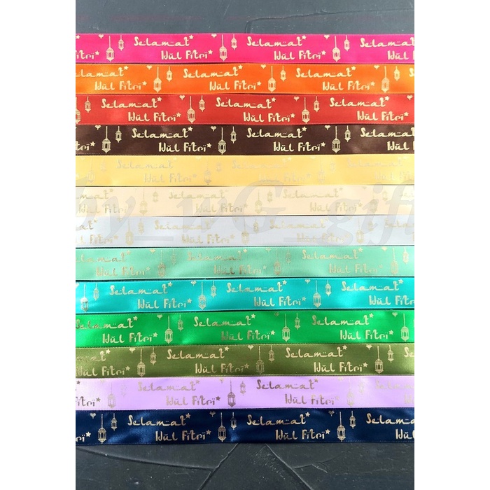 

Pita Idul Fitri -Satin Emboss Emas Motif A ; Mix Colour ;Lebar 2.5 cm