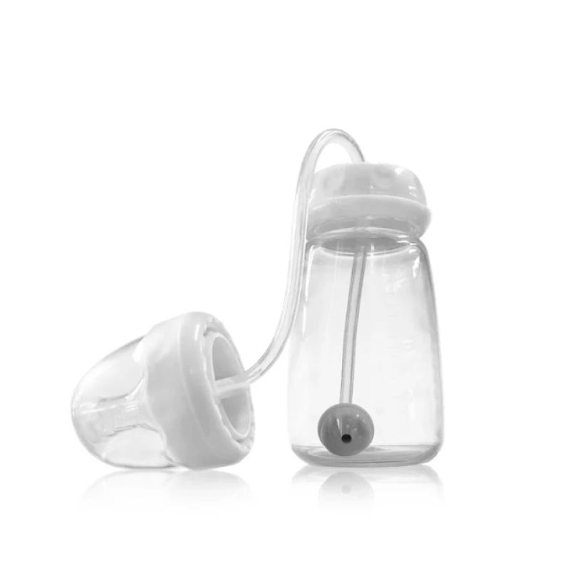 Hands free feeding bottle. Botol susu bayi bebas genggam.