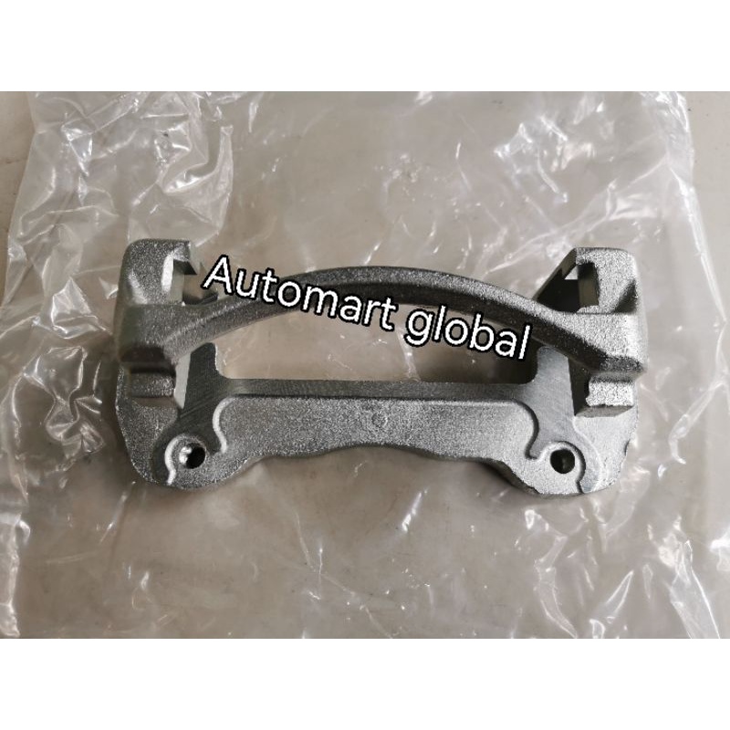 bracket caliper rem depan triton 1pc