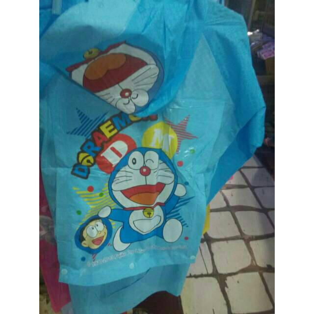 jas hujan anak terusan karakter  doraemon pony h kity frozen lol