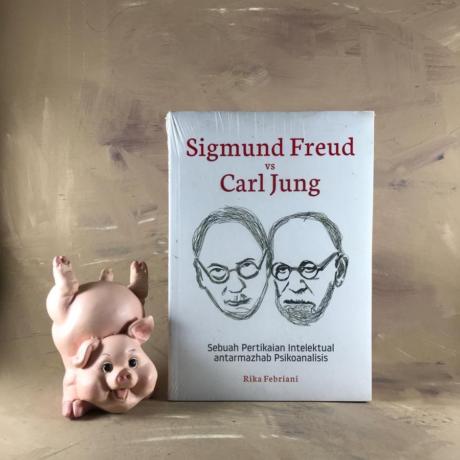 SIGMUND FREUD VS CARL JUNG - Rika Febriani