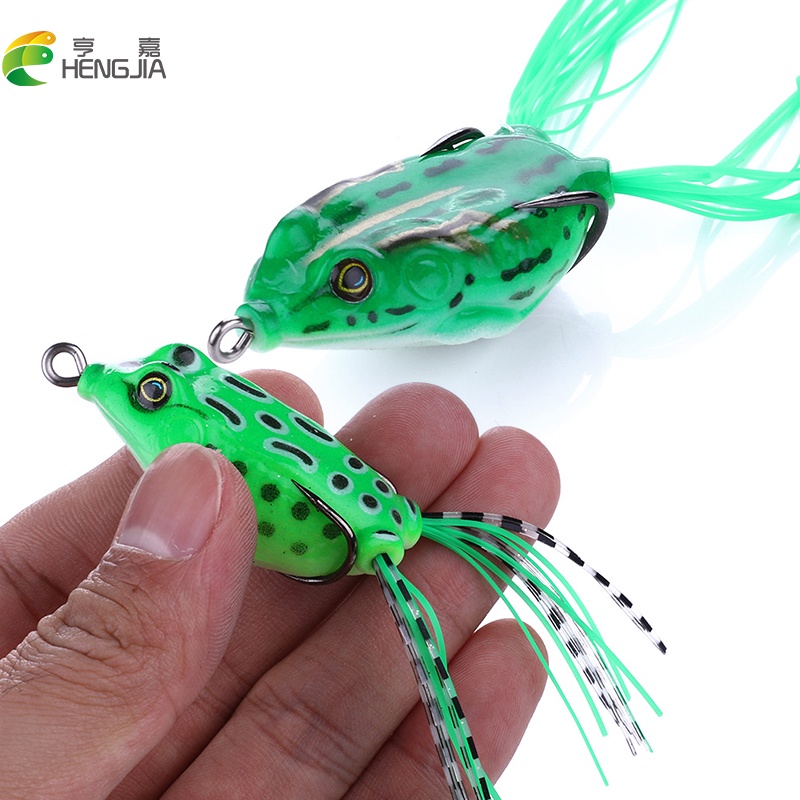 HENGJIA 1pcs New 4cm 5.5cm Soft Jump Frog Fishing Lure Umpan Pancing Swimbait Bentuk Kodok Buatan dengan Kail Ganda Ray Katak Tackle