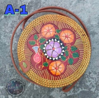  TAS  SELEMPANG WANITA SANTAI BULAT STYLIST ROTAN  BALI UNIK 