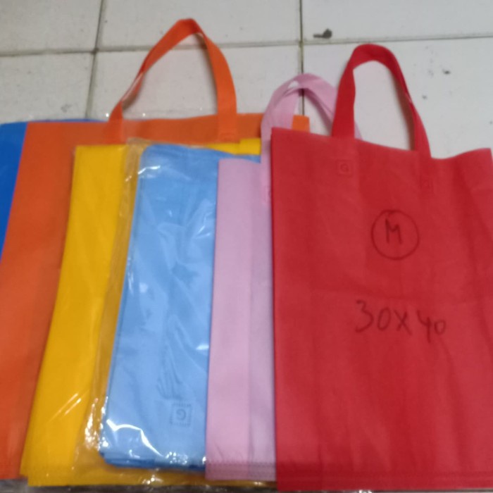 

tas tali / spunbond ukuran M 30x40x8 - Merah