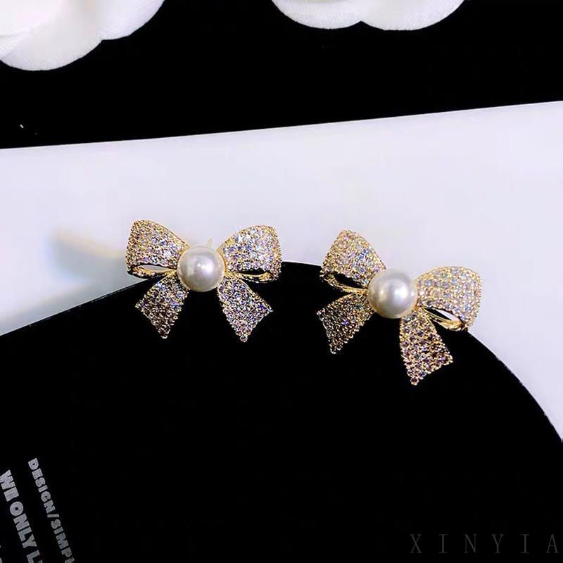 Xia.id Anting Tusuk Gantung Desain Pita Hias Mutiara Gaya Trendy / Simple Untuk Wanita