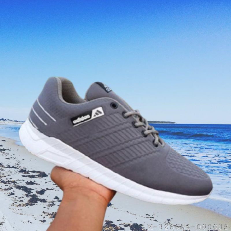 SEPATU SNEAKER PRIA ADIDAS FLYKNIT KANVAS