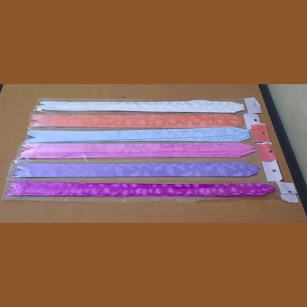 

Pita Tarik/ Pita Serut Motif Fancy 23 mm (1 Pak Isi 10 Pcs)