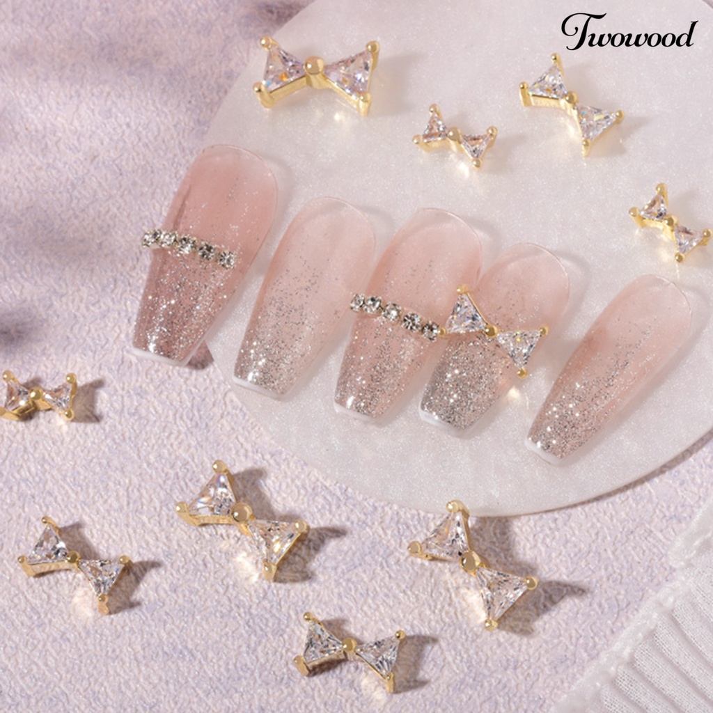 Ornamen Kuku 3D Bentuk Pita Bahan Cubic Zirconia Tahan Korosi Untuk Dekorasi Nail Art Wanita