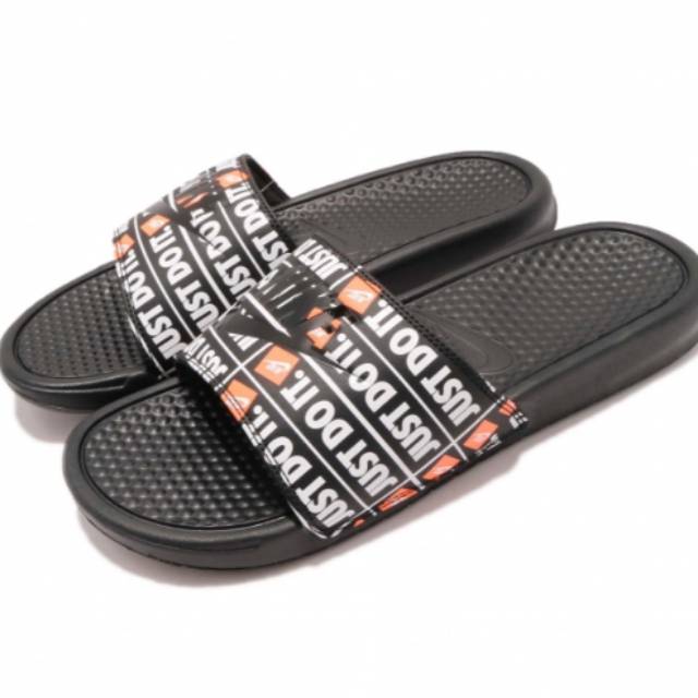 orange nike benassi slides