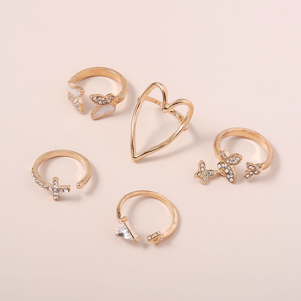 5pcs / Set Cincin Model Terbuka Desain Salib / Segitiga / Hati / Kupu-Kupu Hollow Adjustable Untuk Wanita