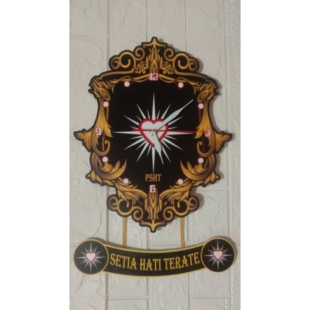 JAM DINDING PSHT/JAM UKIR KAYU SETIA HATI TERATE