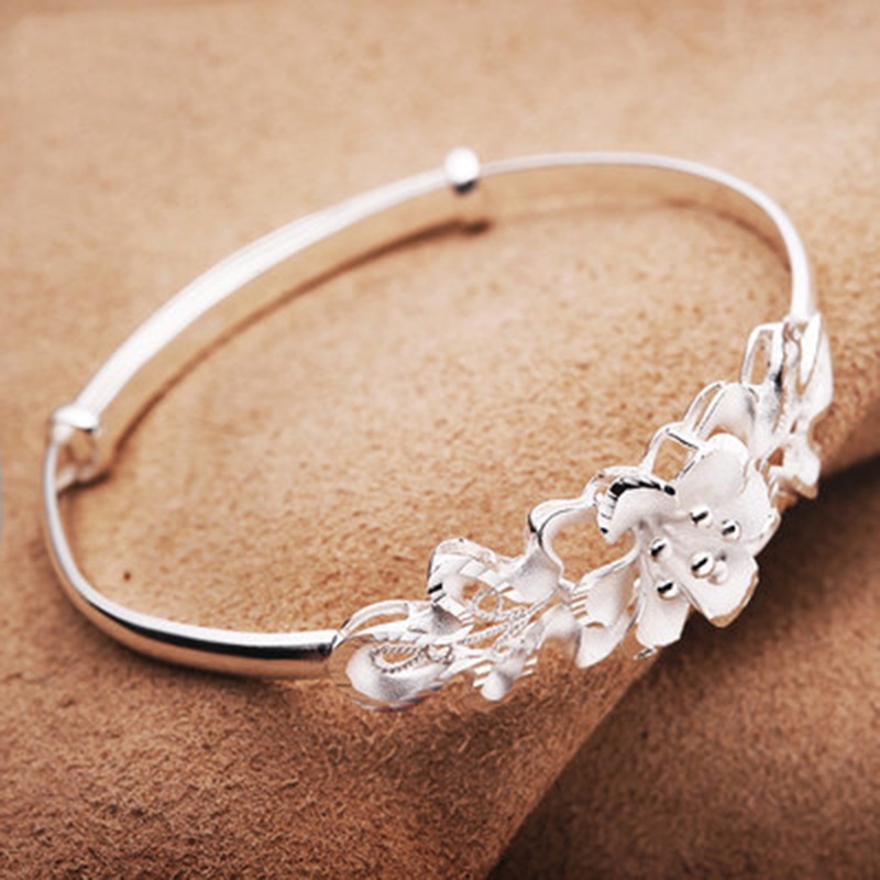 Gelang Adjustable Desain Bunga Bauhinia Bahan Stainless Untuk Wanita