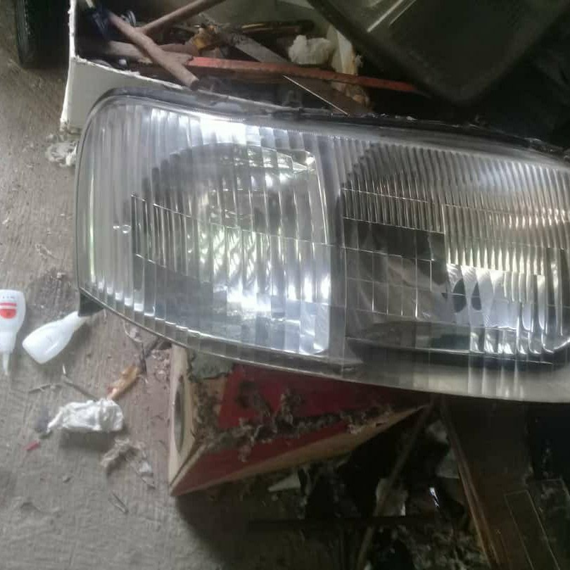 Headlamp Ford Escape Lama original