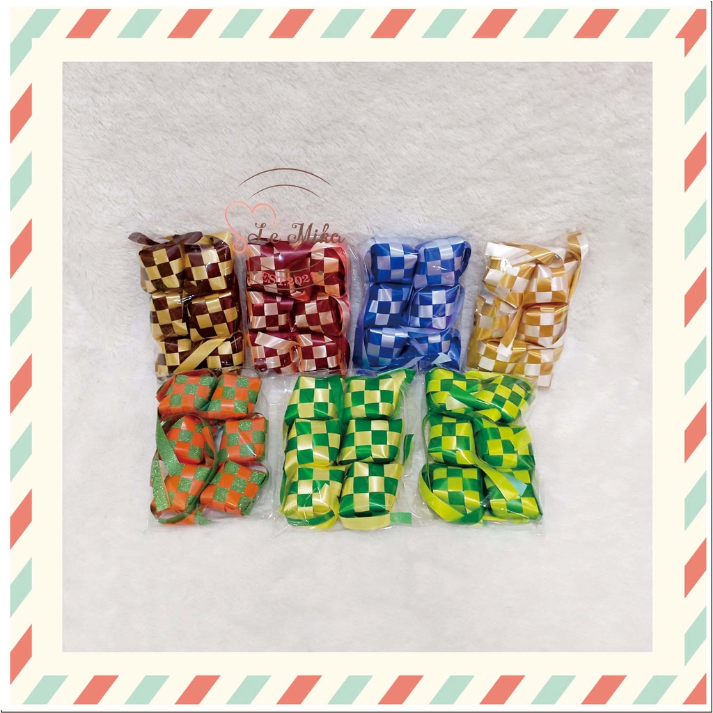 

Hiasan lebaran /Ketupat tanggung medium pita jepang hampers Idul Fitri