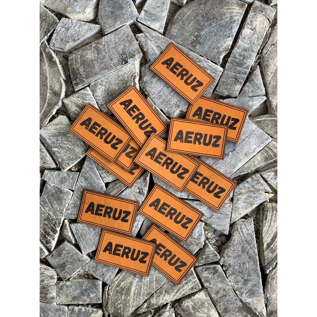 

Cetak Label kulit Asli laser - label leather laser ukuran 1.5x7.5cm