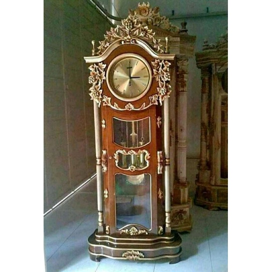 almari jam ukir gadang bandul kayu jati klasik modern furniture mebel jepara