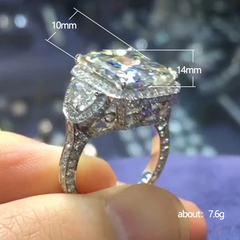 Cincin Nikah / Tunangan Desain Modern Hias CZ Warna Silver Untuk Wanita