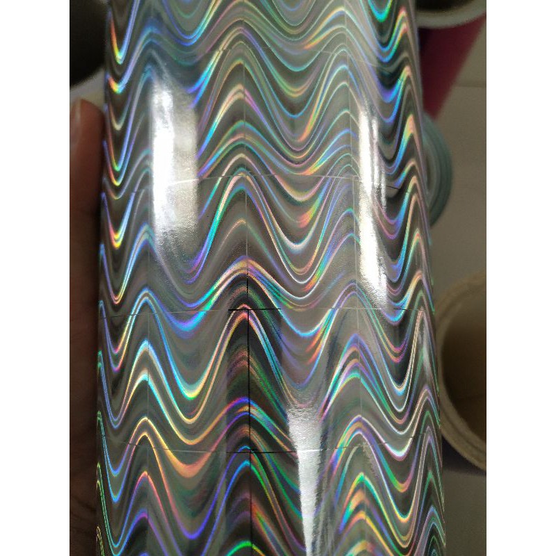 

1 meter x 20cm sticker hologram motif gelombang