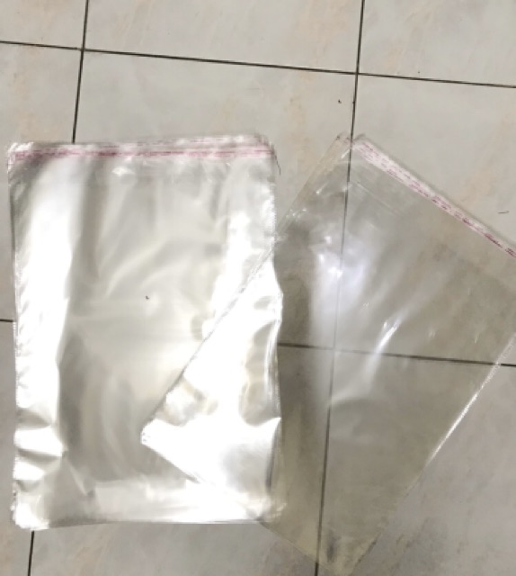 Showme Plastik packing OPP 31x  39   04 lem  / plastik opp / plastik packing / plastik kaca per 100 lembar