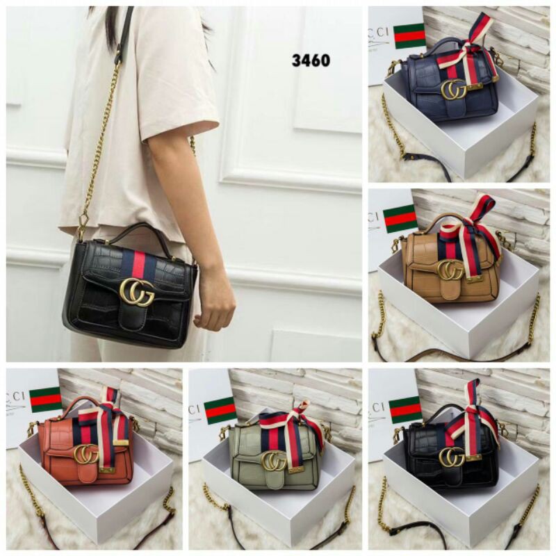 ophidia top handle bag