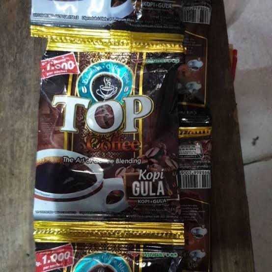 

Kopi Gula TOP COFFEE - 1 renteng (isi 12 sachet @ 25 gram)