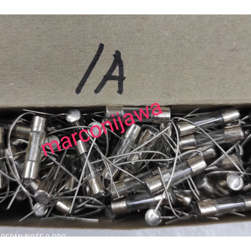 fuse kaca 1A 250V 5x20 kaki