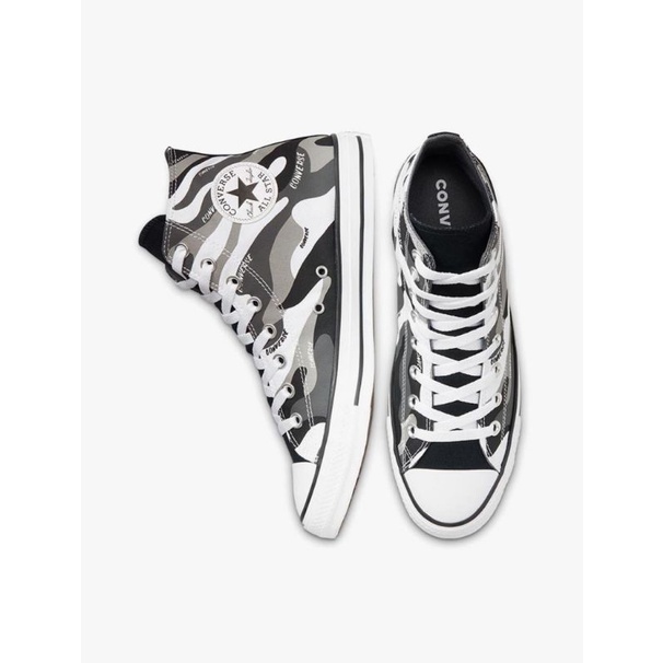 white patterned converse