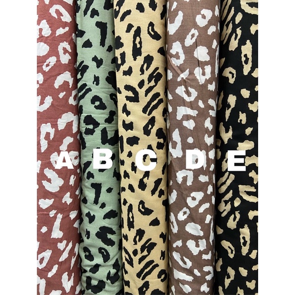 kain rayon motif leopard macan