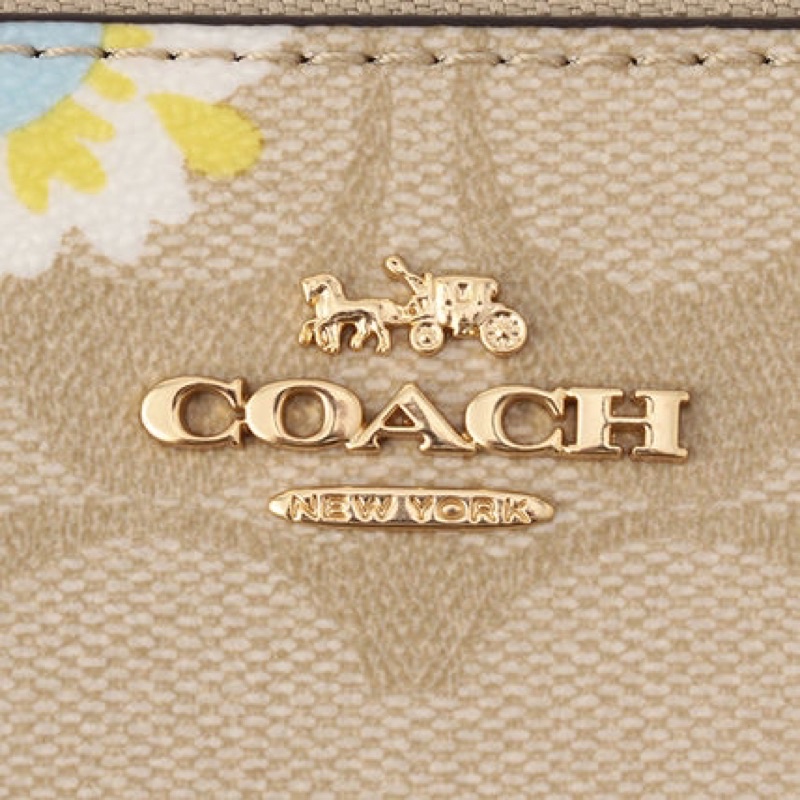 COACH SLIM ENVELOPE WALLET IN SIGNATURE CANVAS WITH DAISY PRINT