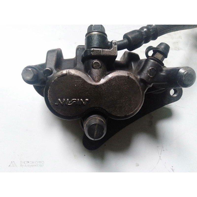 kaliper depan+bracket tiger revo ori second
