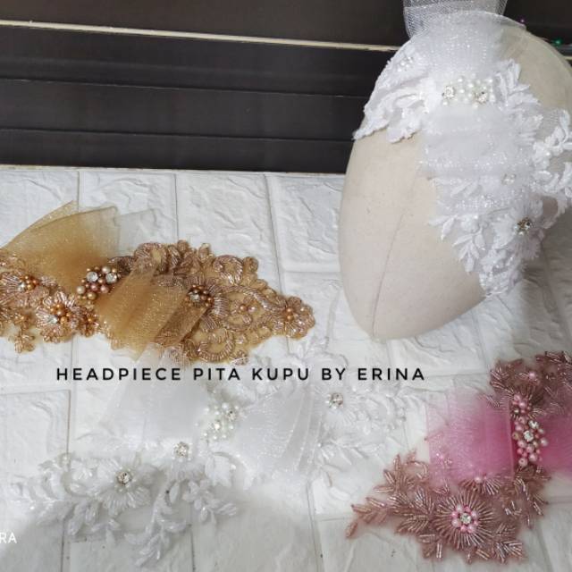 

028 Headpiece pita kupu