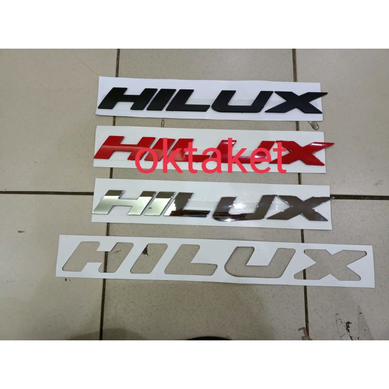 emblem kap mesin HILUX merah hitam chrome